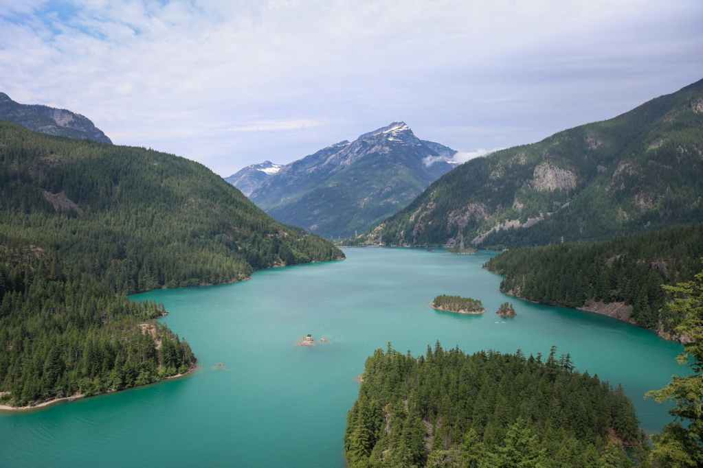 Explore the breathtaking beauty of Diablo Lake from an overlook, capturing the stunning landscape of North Cascades National Park in Washington.